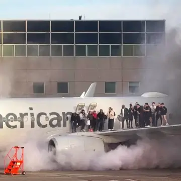 American Airlines Plane Catches Fire After Landing