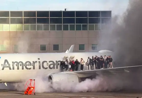 American Airlines Plane Catches Fire After Landing