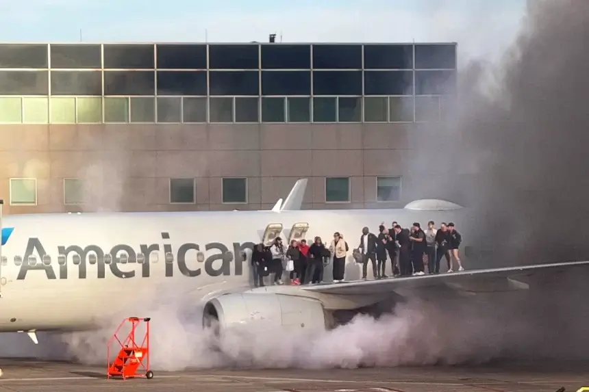 American Airlines Plane Catches Fire After Landing